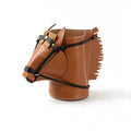 Handcrafted brown leather horse pen holder and desk organizer with sculptural silhouette for equestrian lovers.