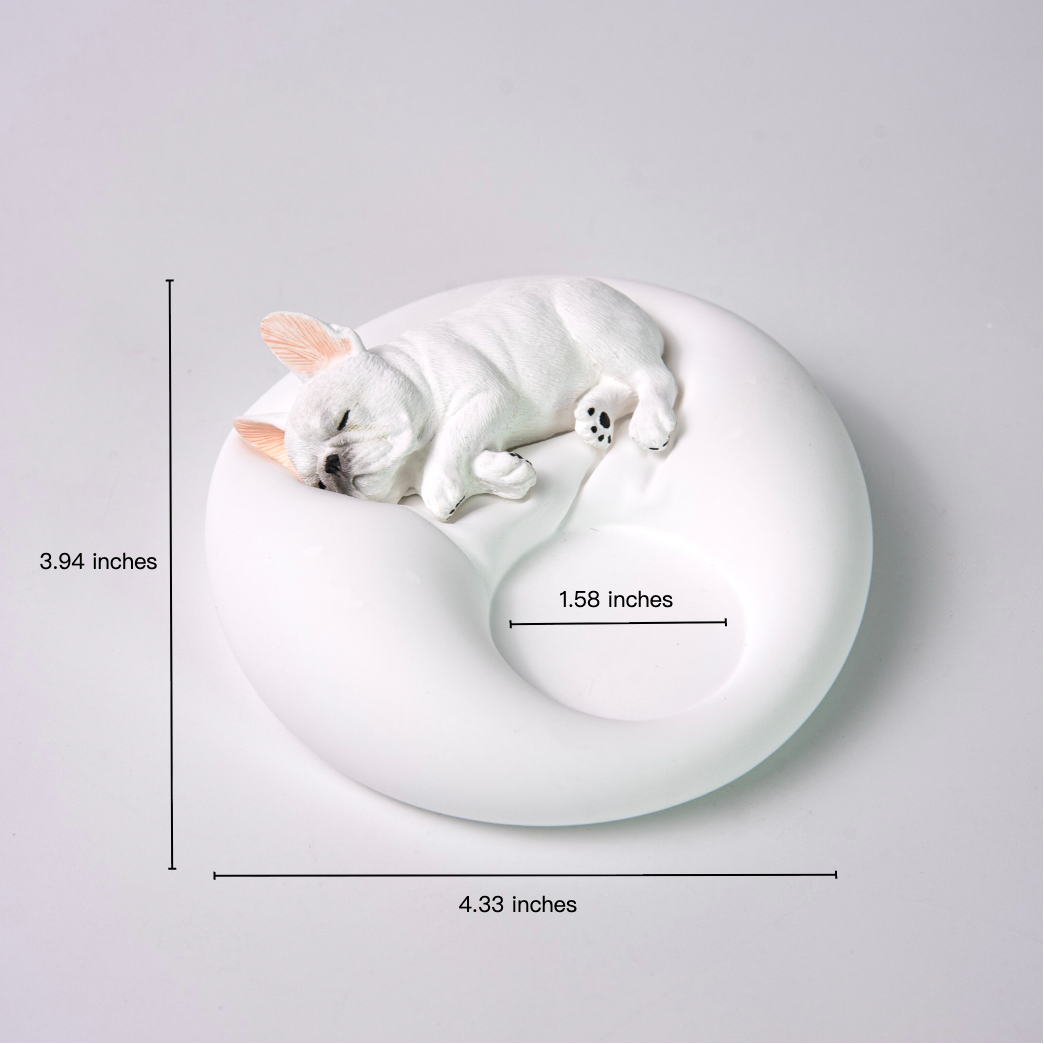 Matte white plaster sleeping French Bulldog candle holder and jewelry tray showing size dimensions of 4.33 by 3.94 inches