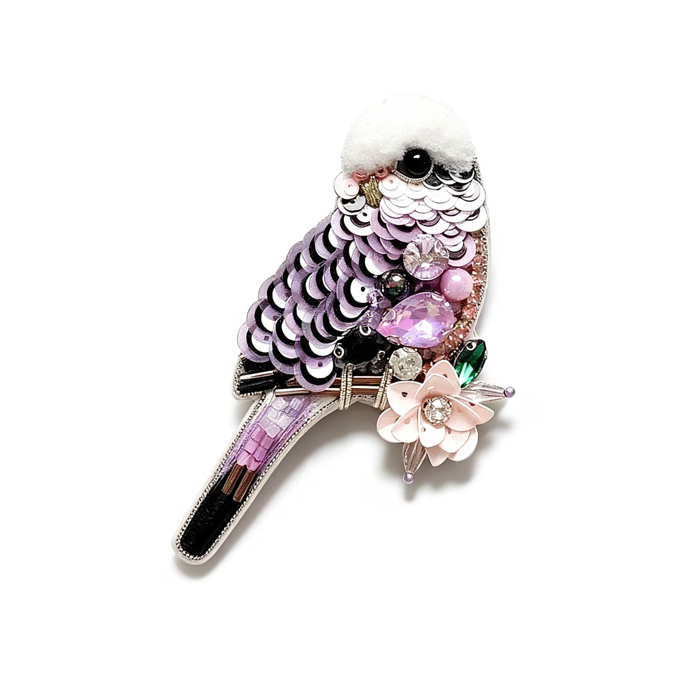 Decorative bird brooch with sequins, beads, and a flower on a white background