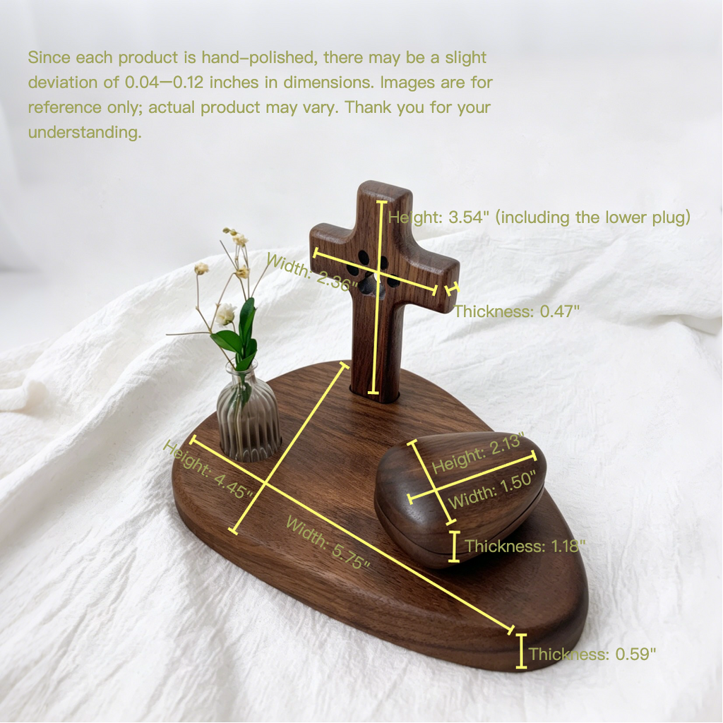 Wooden cross and heart-shaped object with measurements on a white fabric background