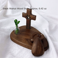 Wooden product with a cross design on a white fabric background