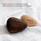 Two engraved wooden stones on a white fabric background with text about engraving messages.