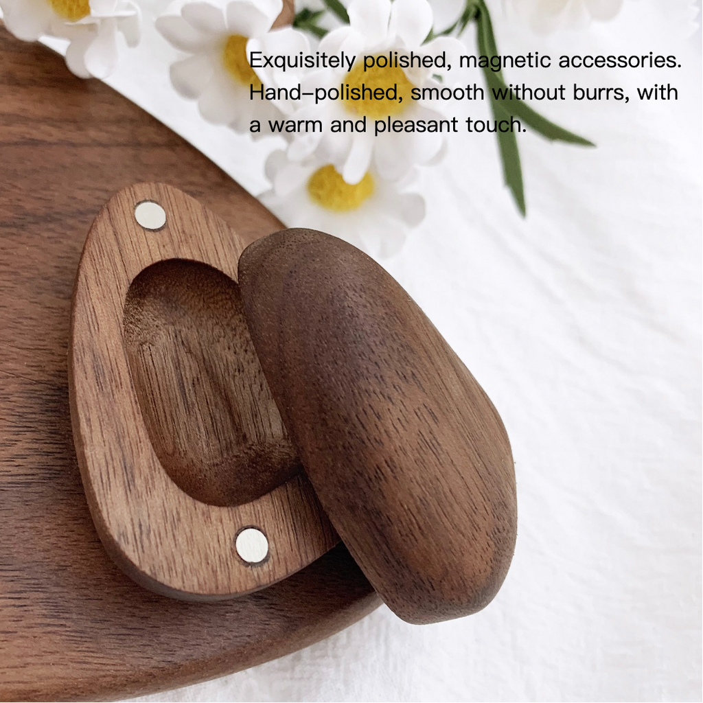 Wooden magnetic accessory on a wooden surface with text describing its qualities.