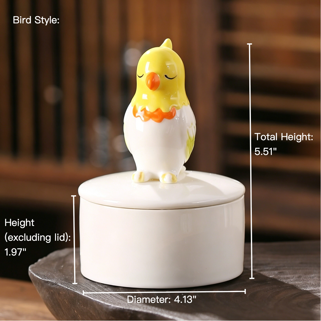 Decorative ceramic bird on a lid with measurements indicated
