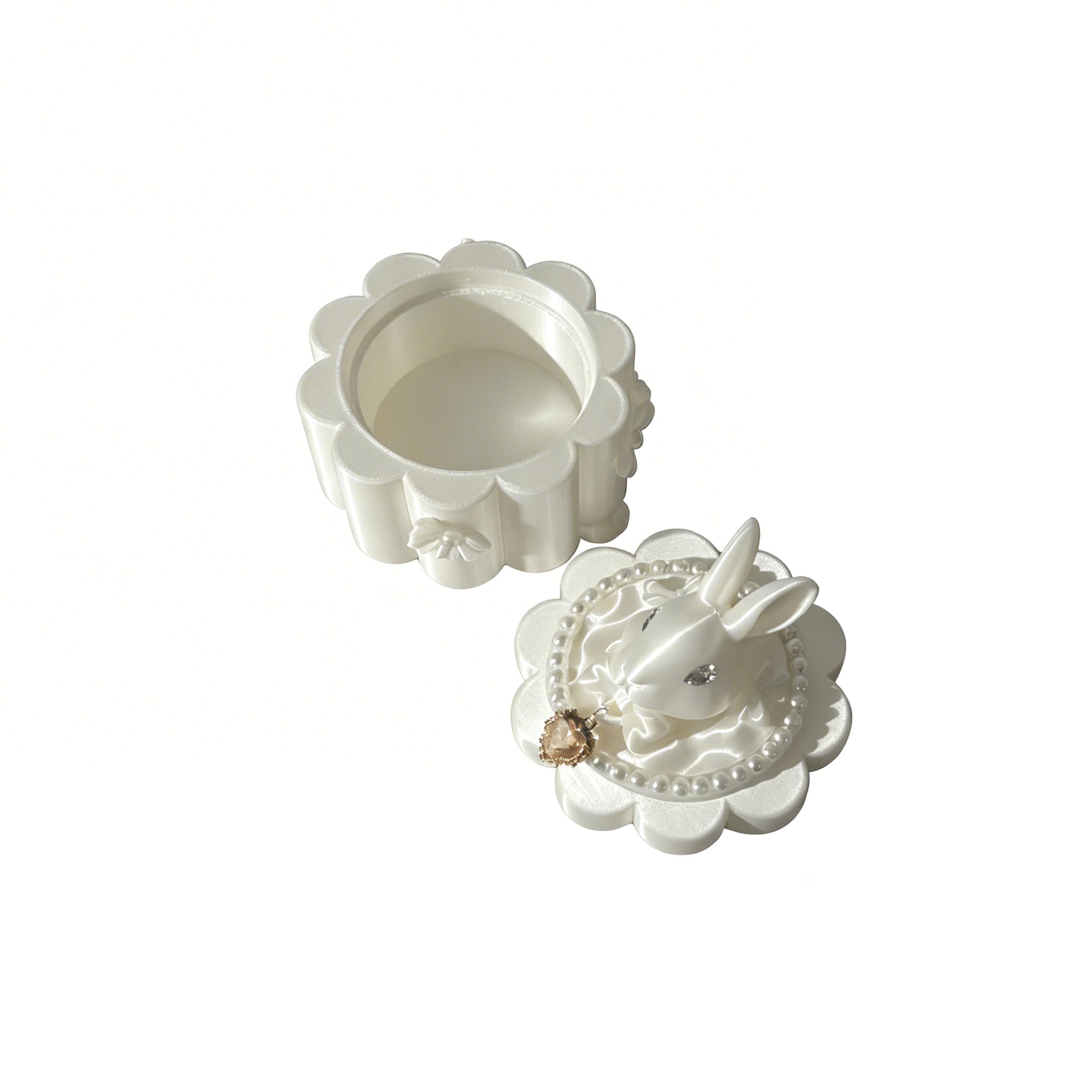 White decorative box with floral design on a white background