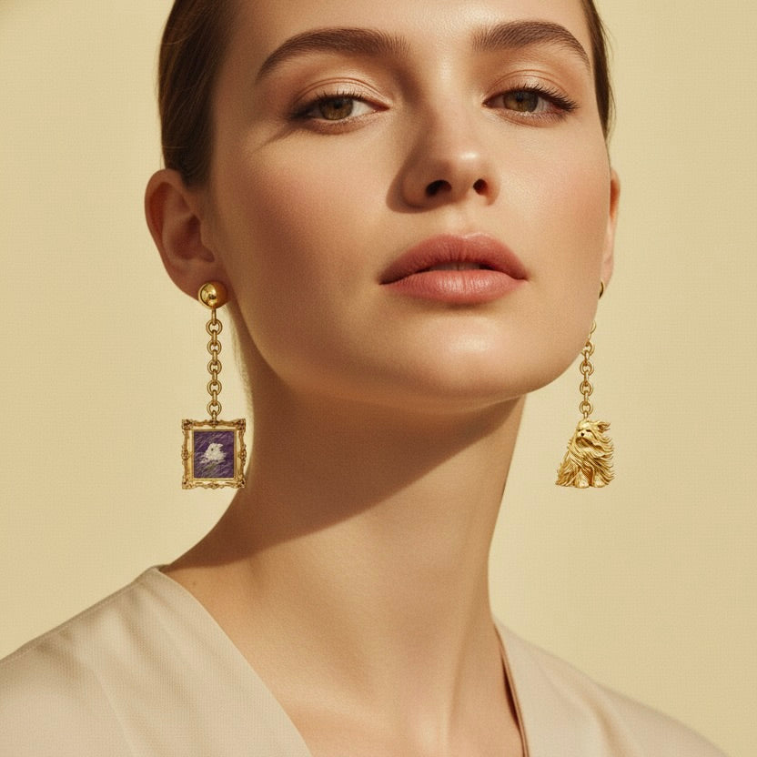 Close-up of a woman wearing gold earrings with intricate designs on a beige background
