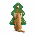 An orange tabby cat stretching upward to scratch a green Christmas tree wall-mounted cat scratcher made of natural sisal, making it a perfect holiday gift for indoor cats.
