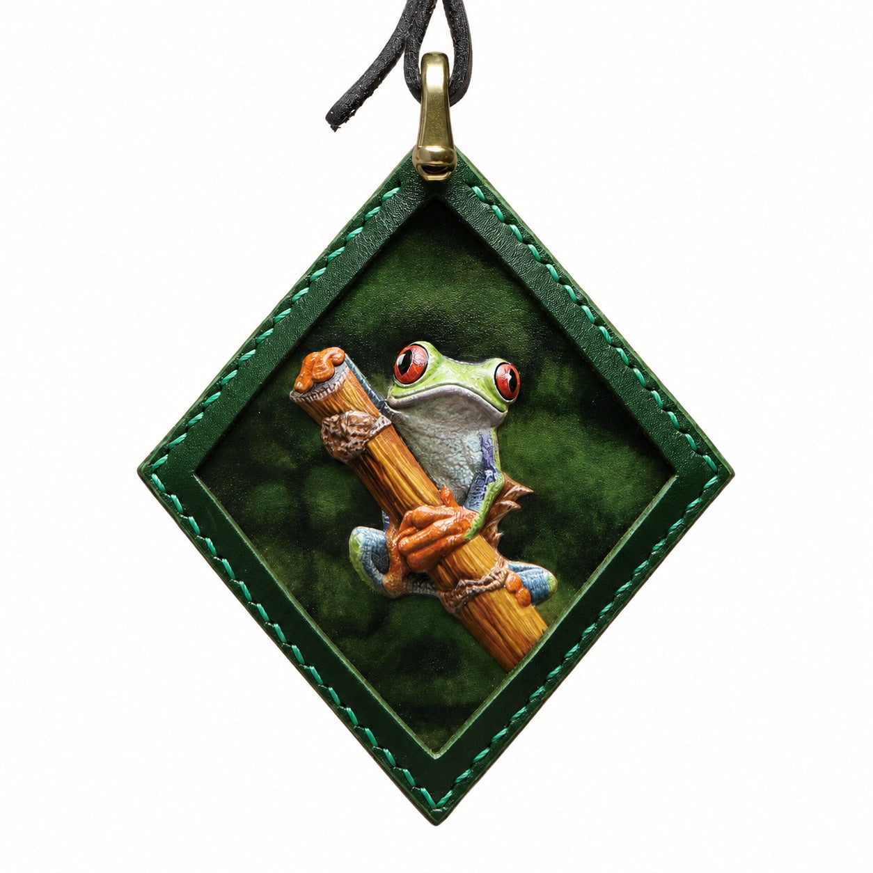 Get a personalized hand carved leather pet keychain from your photo! Our bespoke exotic animal pendants make the perfect 3D pet memorial gift or luxury bag charm.