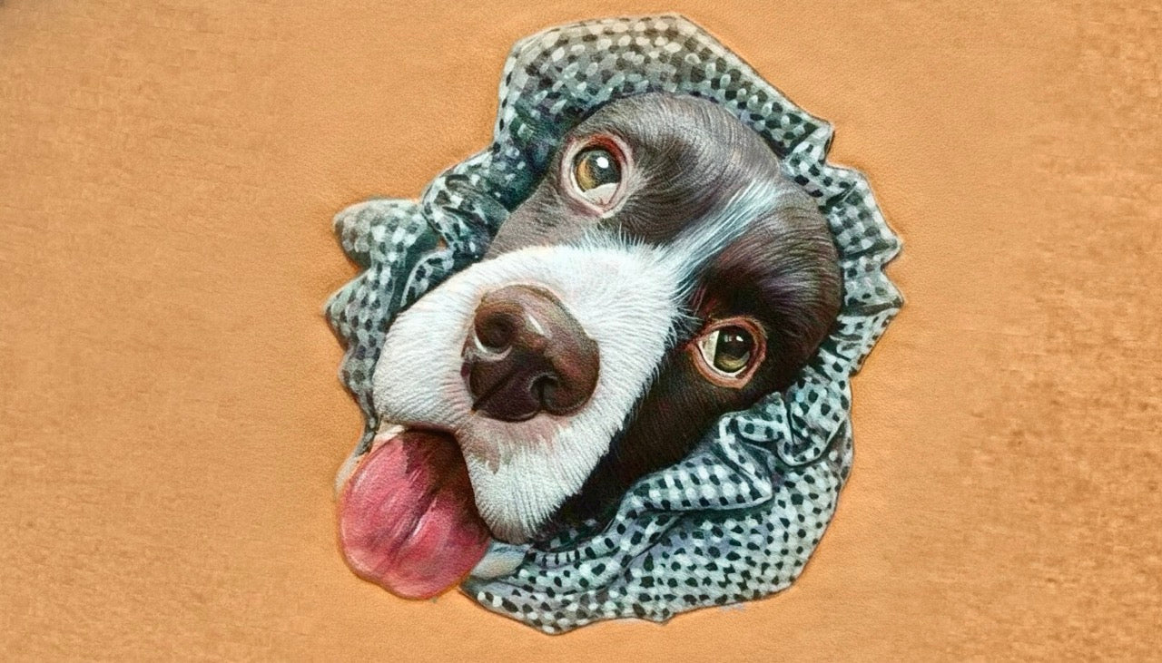 A handcrafted 3D leather pet portrait of an English Springer Spaniel with a checkered scarf, showcasing the intricate leather relief carving and detailed hand-painted texture.