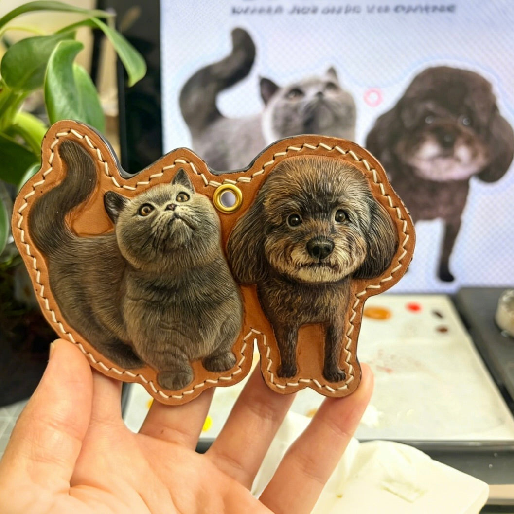 Custom 3d leather pet portrait keychain in an irregular full body layout featuring a hand-carved Samoyed dog with green stitching