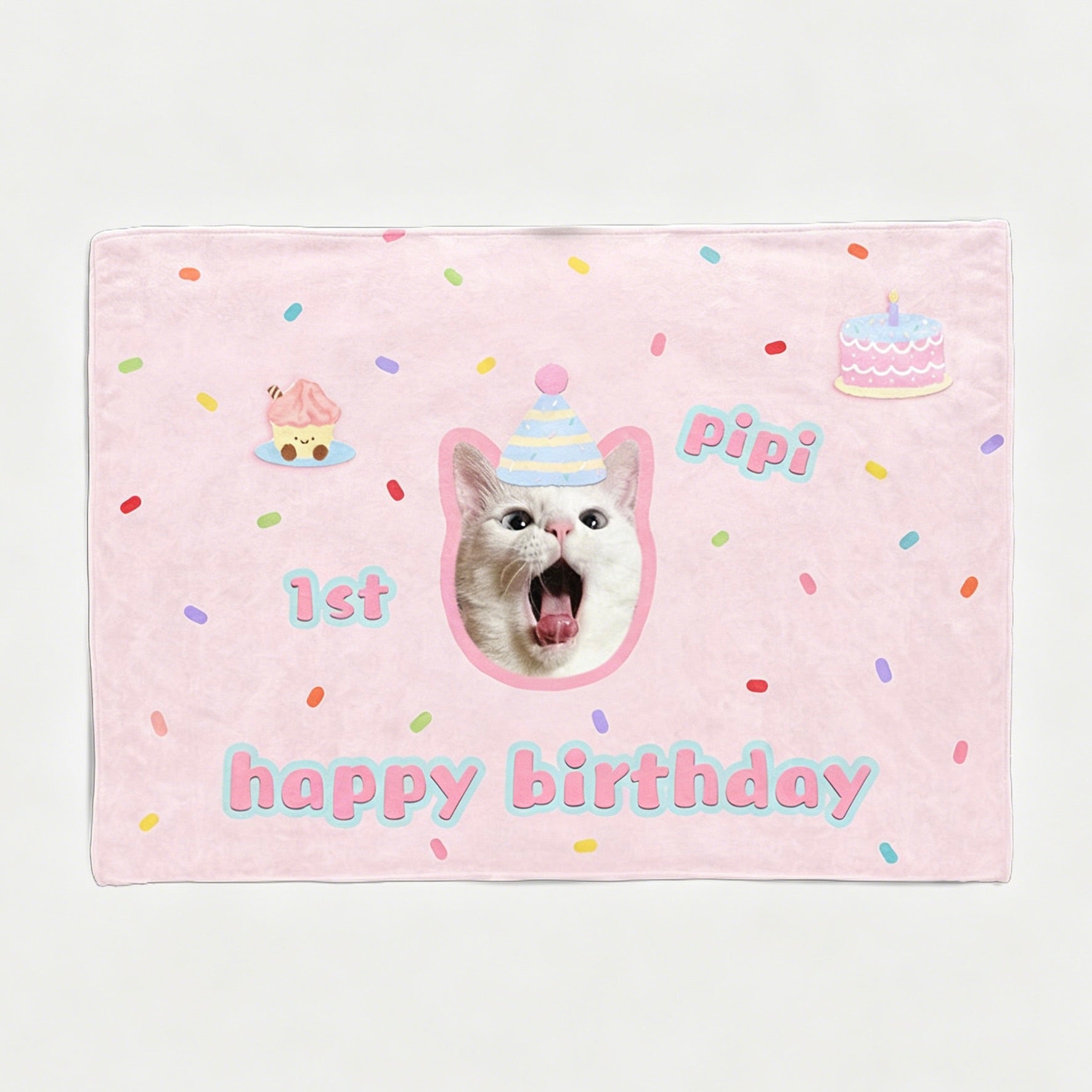 A pastel pink custom cat portrait 1st birthday backdrop tapestry featuring a cute white cat wearing a party hat, with the text happy birthday 1st pipi.