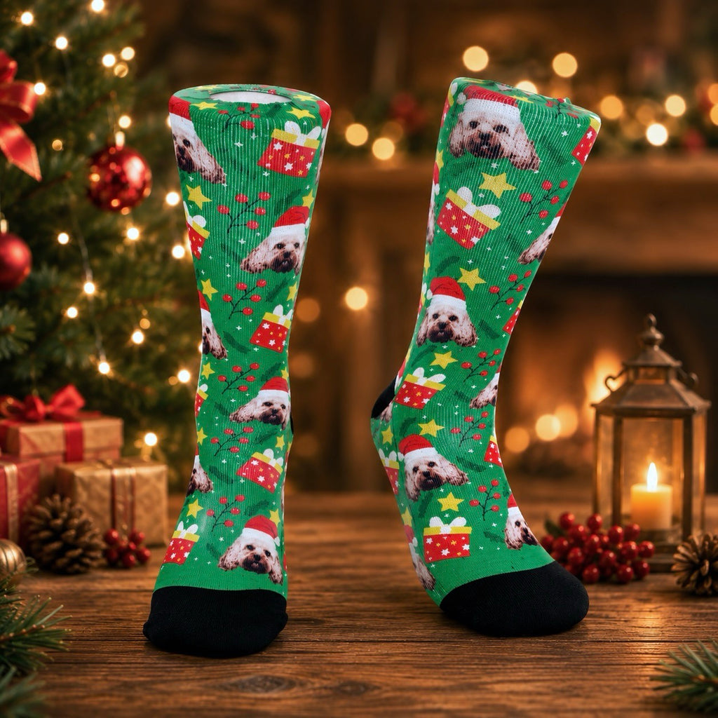 Green custom dog face Christmas socks displayed among ornaments and holiday gifts