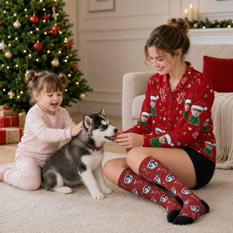 Woman wearing custom husky Christmas socks beside a child and dog in a festive room