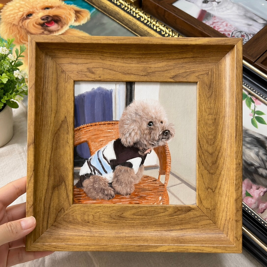 Custom hand-painted oil portrait of a small curly-haired dog wearing a vest, presented in a natural wood frame.