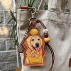 A custom illustrated Schnauzer dog portrait leather bag charm wearing sunglasses and a yellow striped shirt, styled as a personalized pet photo keychain with decorative beads.