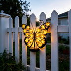 Cozy summer evening garden setup featuring the wireless decorative outdoor LED butterfly light illuminating a porch wall.