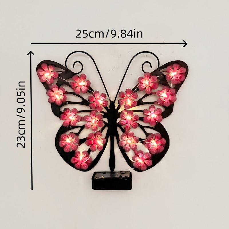 Pink waterproof solar butterfly wall decor light for a romantic balcony accent