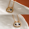 Front and back of a double-sided mother-of-pearl necklace customized with dog and cat portraits