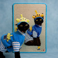 Frameless custom cat scratcher board mounted on the wall to save space and protect furniture.