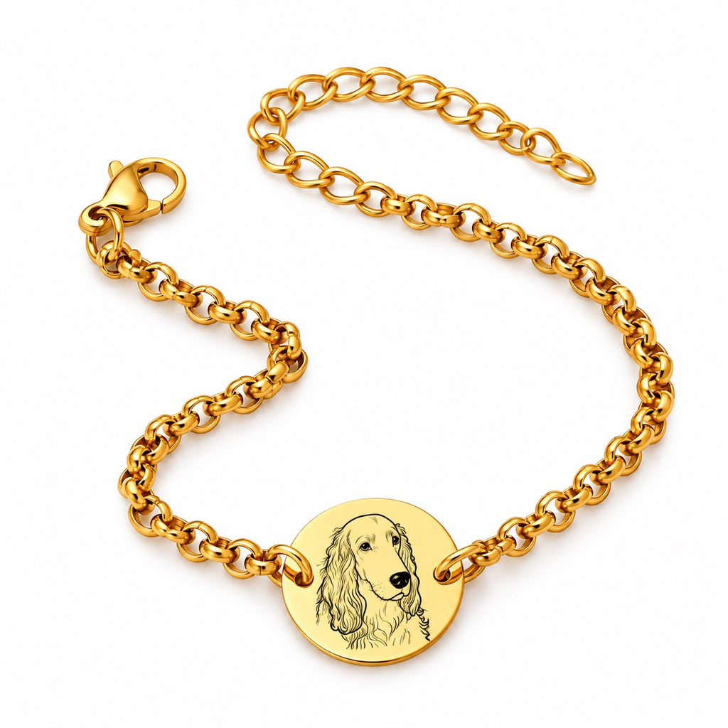 Gold-tone personalized bracelet with a round charm engraved with a dog portrait