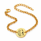 Gold-tone personalized bracelet with a round charm engraved with a dog portrait