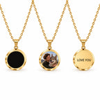 Gold custom heat-reveal photo necklace shown black, displaying a pet photo and engraved on the back