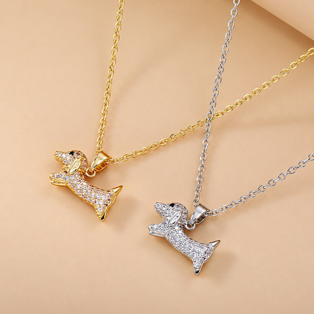 Gold-tone and silver-tone dachshund pendant necklaces with clear cubic zirconia accents