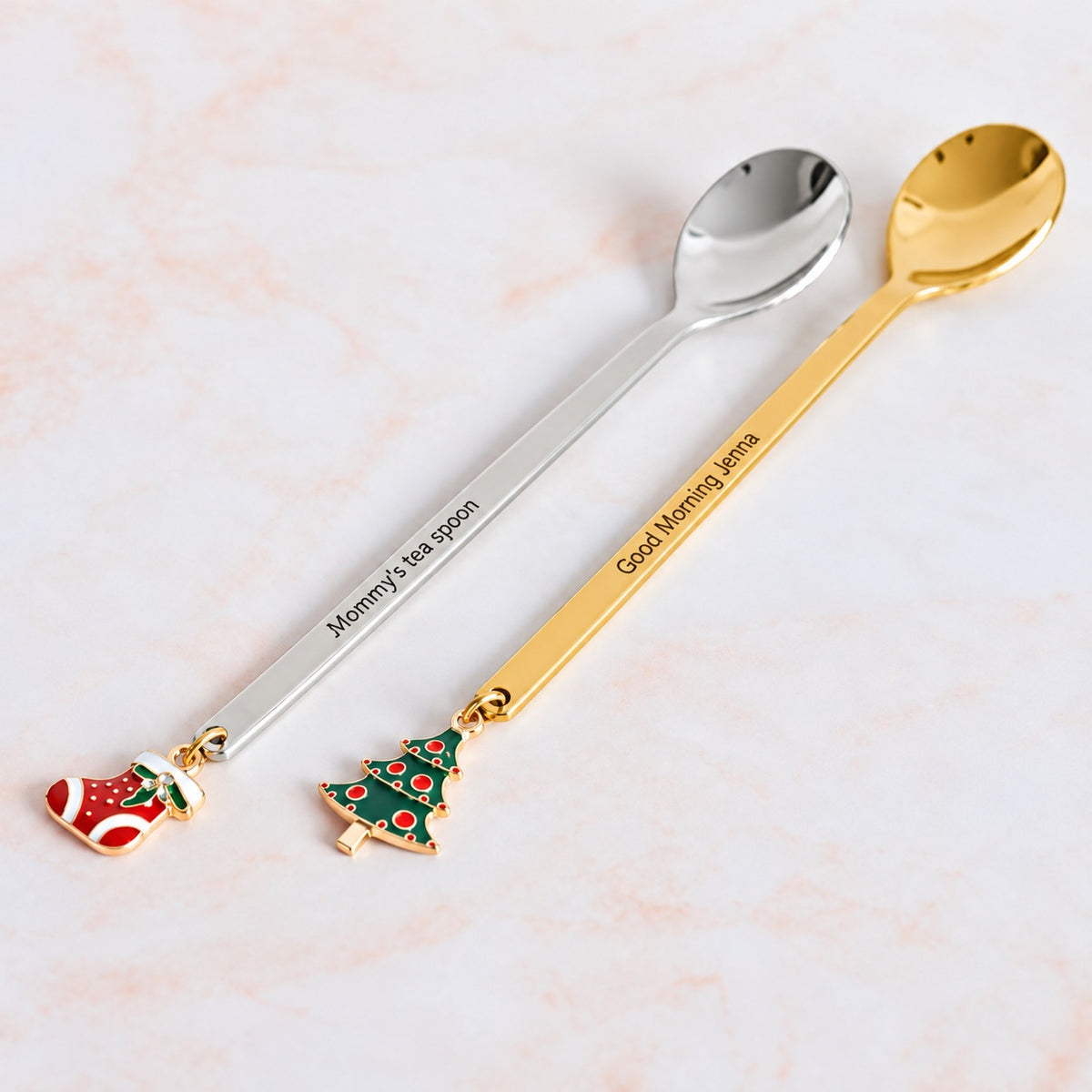 Gold-tone Christmas tree spoon and silver-tone stocking spoon personalized with custom text