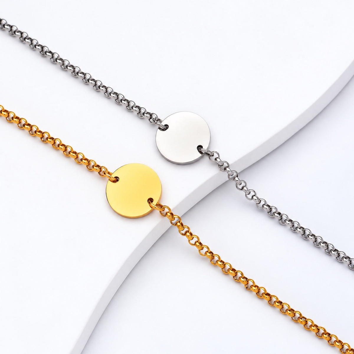 Gold-tone and silver-tone chain bracelets with blank round personalization discs