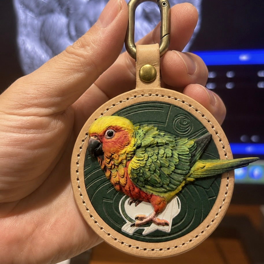 leather keychain custom-made from photo, showcasing a detailed raised relief of a colorful conure bird. A perfect personalized gift for parrot lovers and bird moms as a durable everyday accessory.