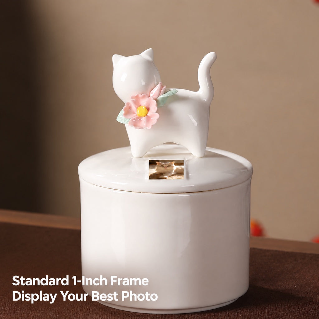Large ivory ceramic cat memorial urn with pink flowers and a small printed cat photo in the designated one-inch display area