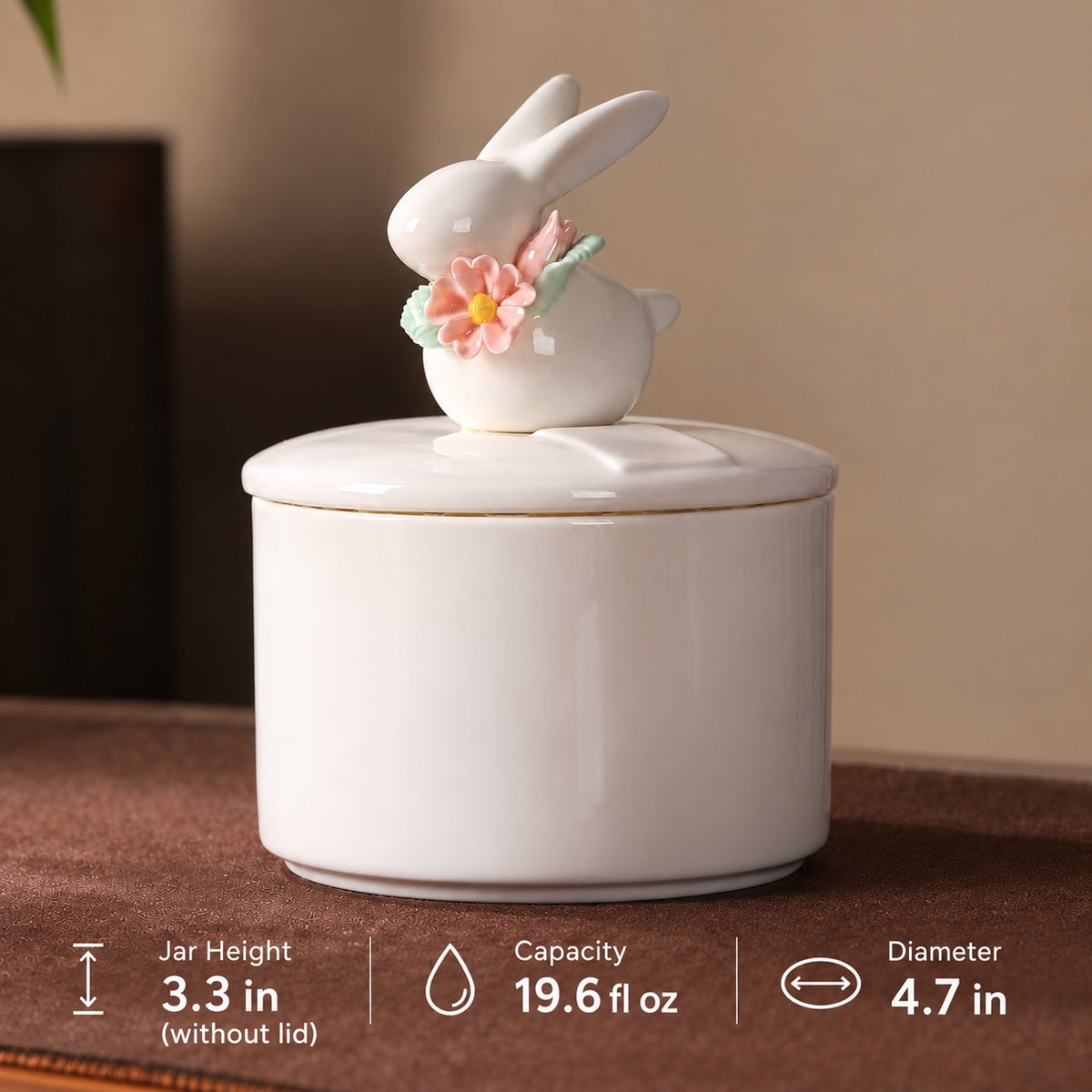 Large floral rabbit memorial urn size guide showing 3.3 inch jar height, 19.6 fluid ounce volume and 4.7 inch diameter