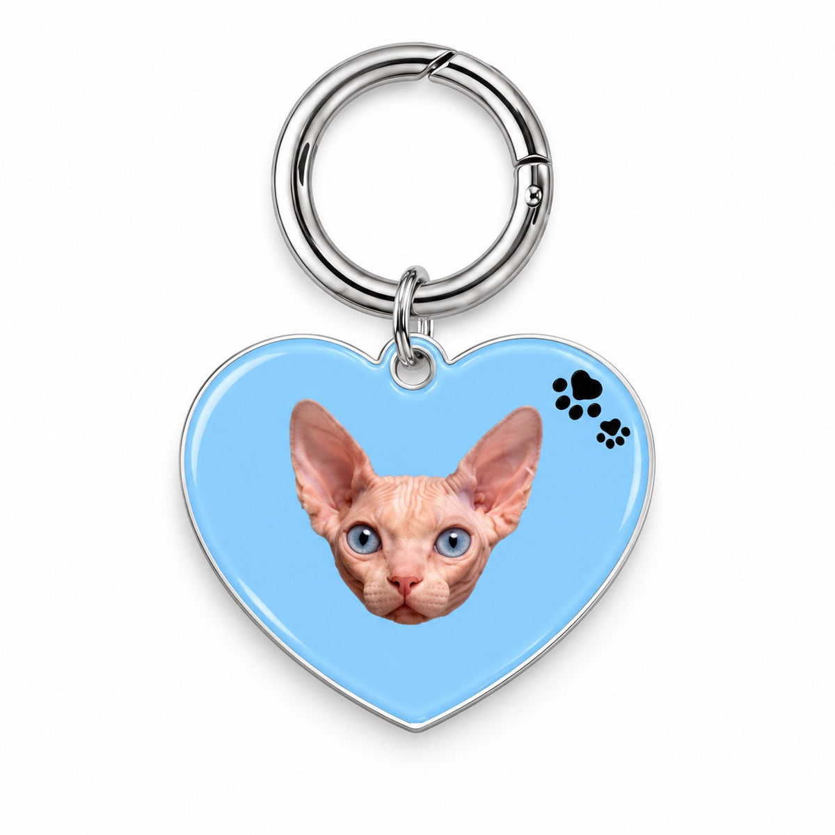 Light blue heart-shaped acrylic tag with a custom Sphynx cat portrait