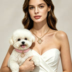 A woman and her Shiba Inu dog wearing matching custom shared human-pet jewelry. The set includes a gold necklace for the owner and a brown collar for the dog, both featuring a gold heart-shaped photo locket and a custom birthstone charm.