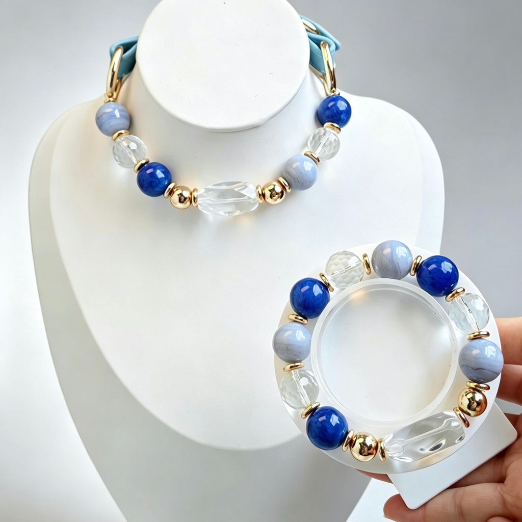 Matching pet and owner crystal bracelet collar set on white background