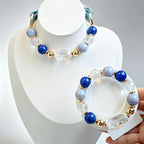Matching pet and owner crystal bracelet collar set on white background
