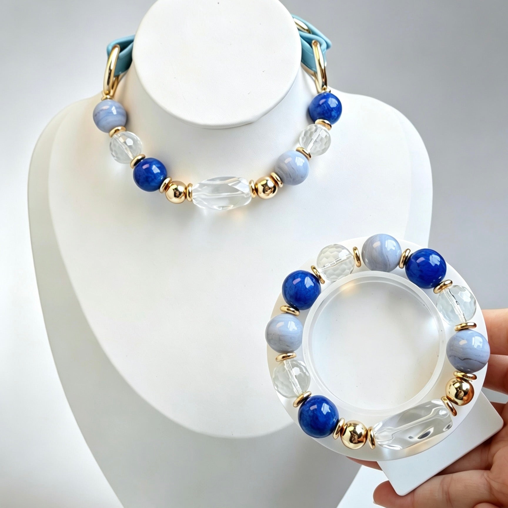 Matching pet and owner crystal bracelet collar set on white background
