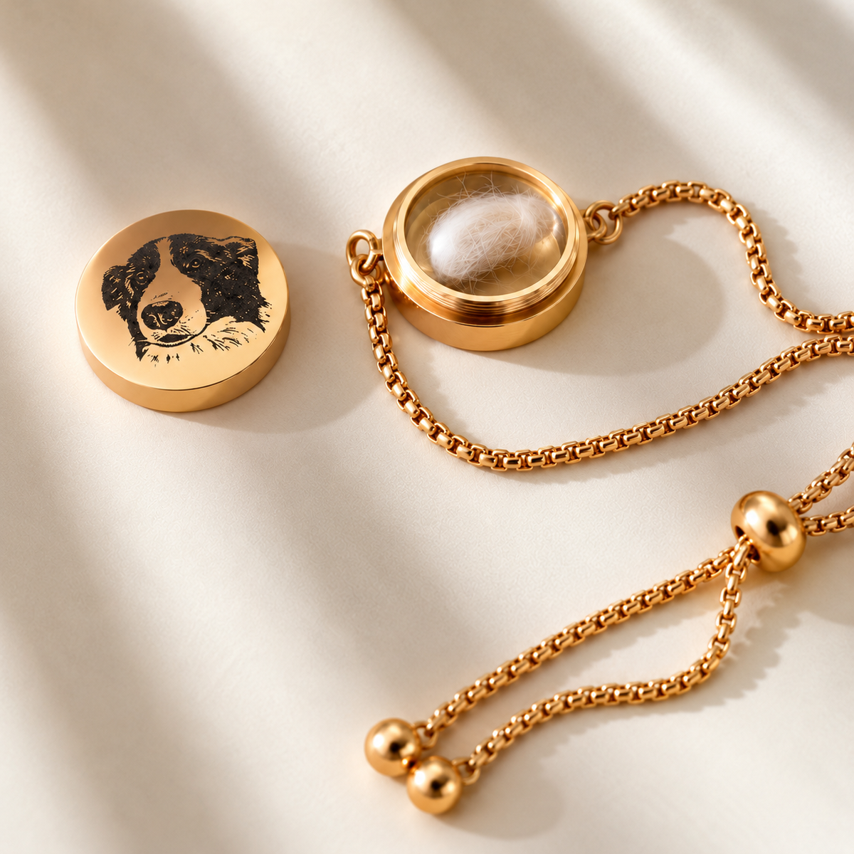 Open gold pet portrait bracelet showing the small interior compartment with a clipping of fur