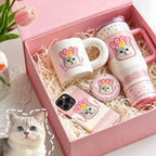 Personalized pet photo gift box including a custom pet portrait coffee mug, travel tumbler, and matching phone case created from a pet's picture.