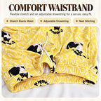 Close-up of the yellow cat-print pajama pants with elastic waistband and adjustable white drawstring