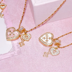Pink and white custom heart photo locket necklaces with gold-tone chains and zircon key charms