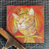 Behind-the-scenes video showing the detailed hand-carving and hand-coloring process of a custom woodcut pet portrait print.