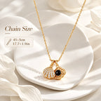 Gold-tone projection shell necklace with 17.7 inch chain and 1.9 inch extender