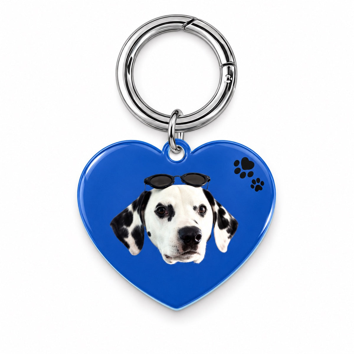 Royal blue heart-shaped dog tag with a custom Dalmatian portrait and paw-print details
