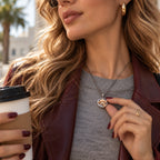Model wearing a silver heat-reveal necklace with a custom dog photo visible on the pendant