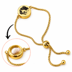 Gold adjustable pet memorial bracelet with an inset view of its hair keepsake compartment