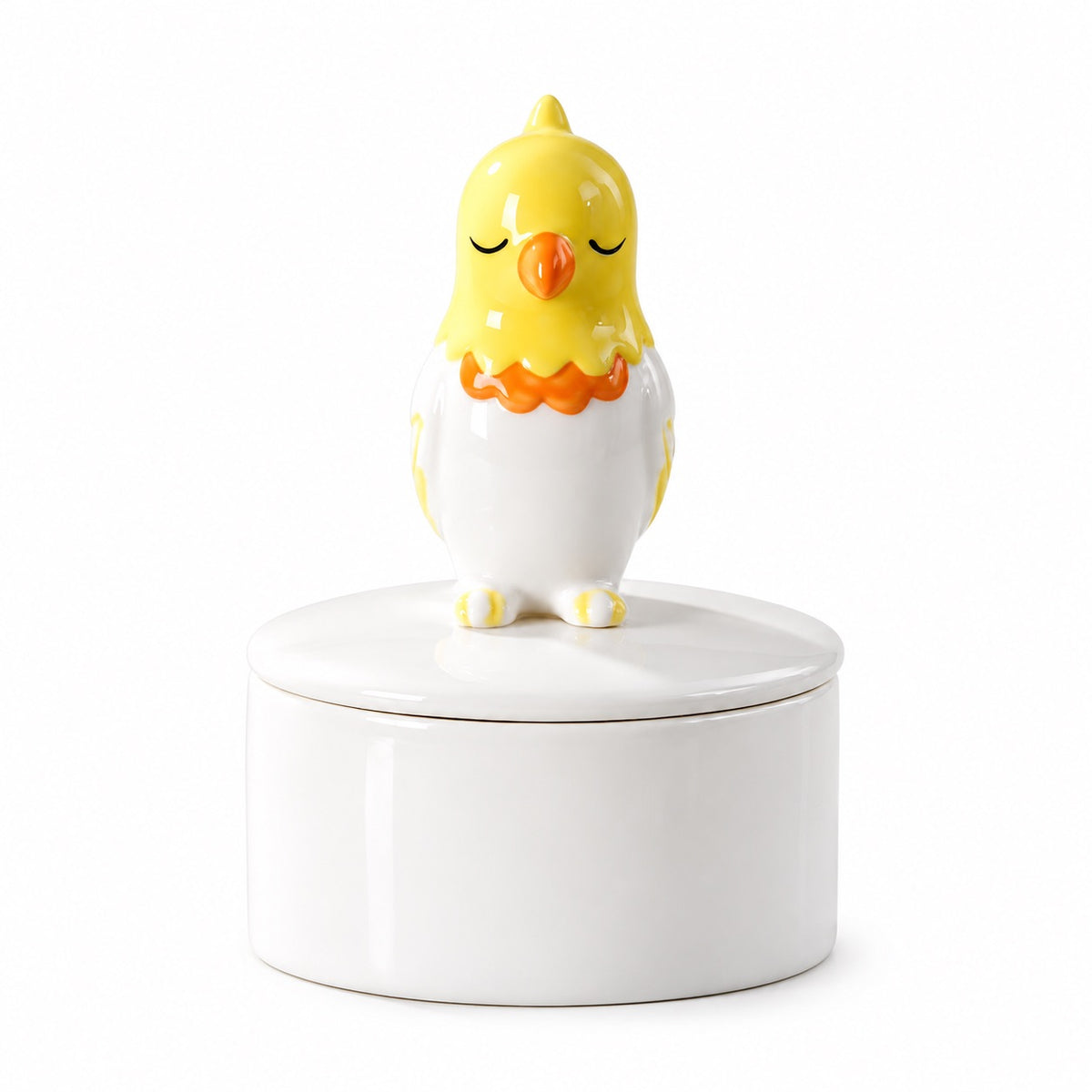 Ceramic bird memorial urn with a yellow, white and orange bird figure with closed eyes on the lid